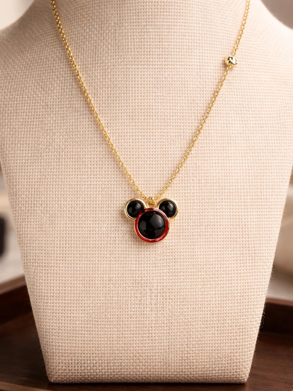 Coach Gold-Tone Necklace with Black and Red Enamel Mickey-Inspired Pendant